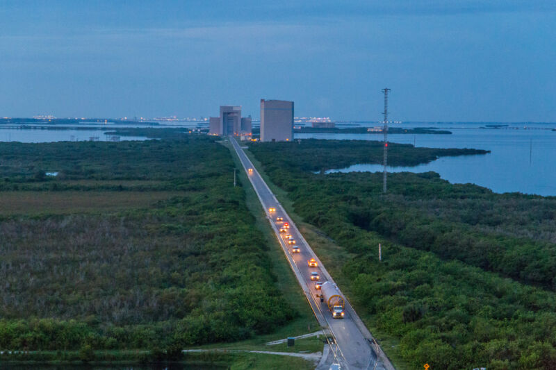 United Launch Alliance moves its Atlas V booster into the Vertical Integration Facility adjacent to Space Launch Complex-41 at Cape Canaveral Space Force Station on Monday, August 26.