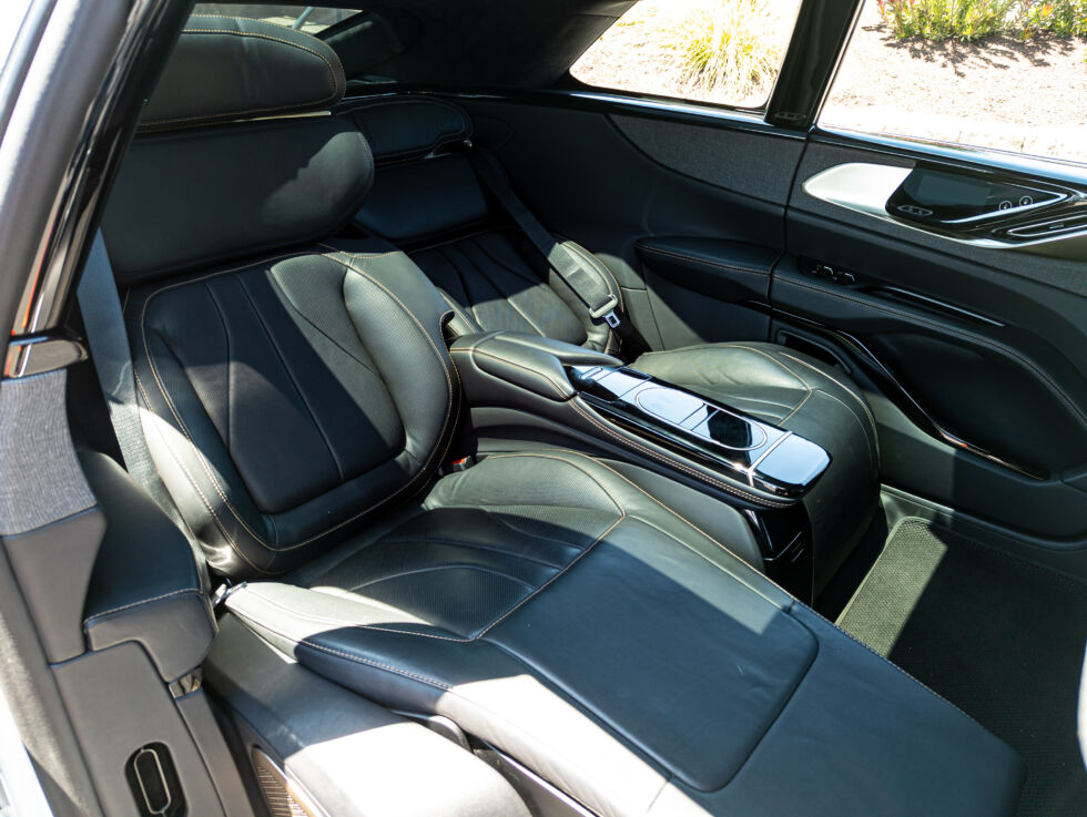 Lucid and Faraday Future have tried incorporating business-class aircraft seats into the back of their electric cars.  Neither of them has been entirely successful so far.
