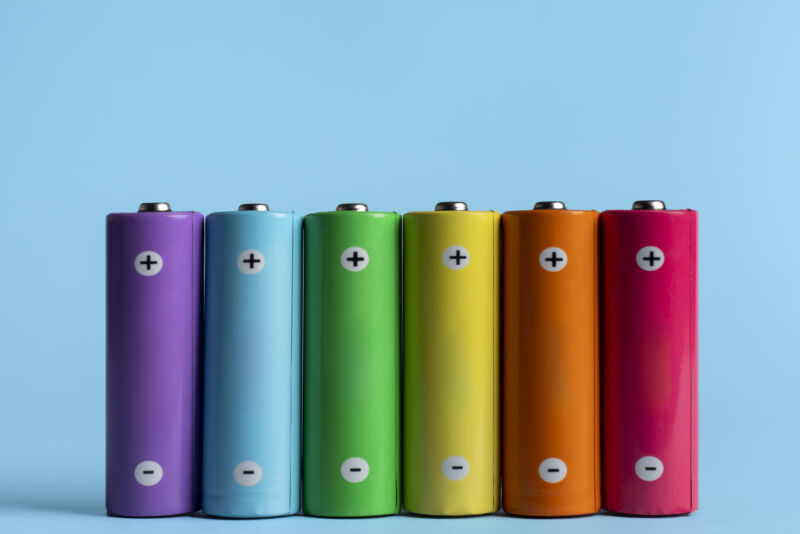 Image of a row of batteries, each a different color.