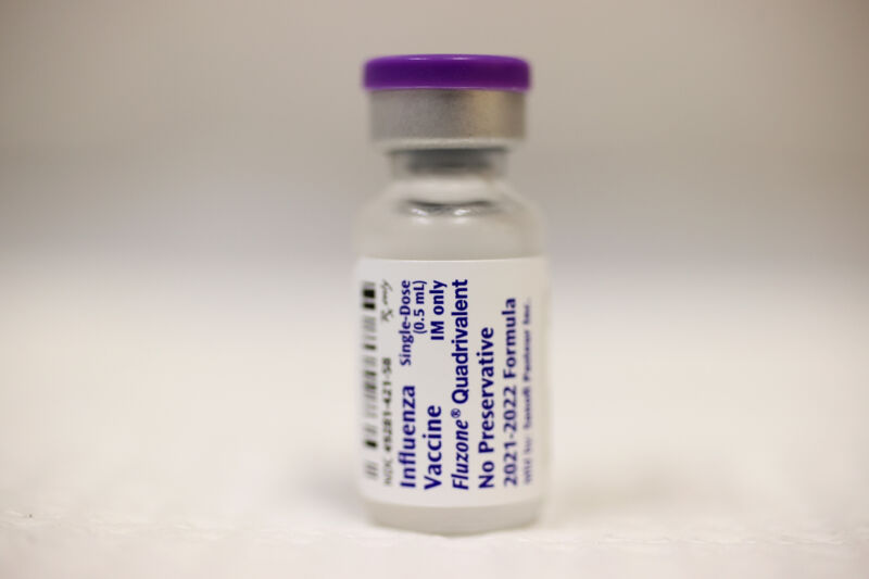 A bottle of influenza vaccine at a CVS pharmacy and MinuteClinic on September 10, 2021, in Miami.