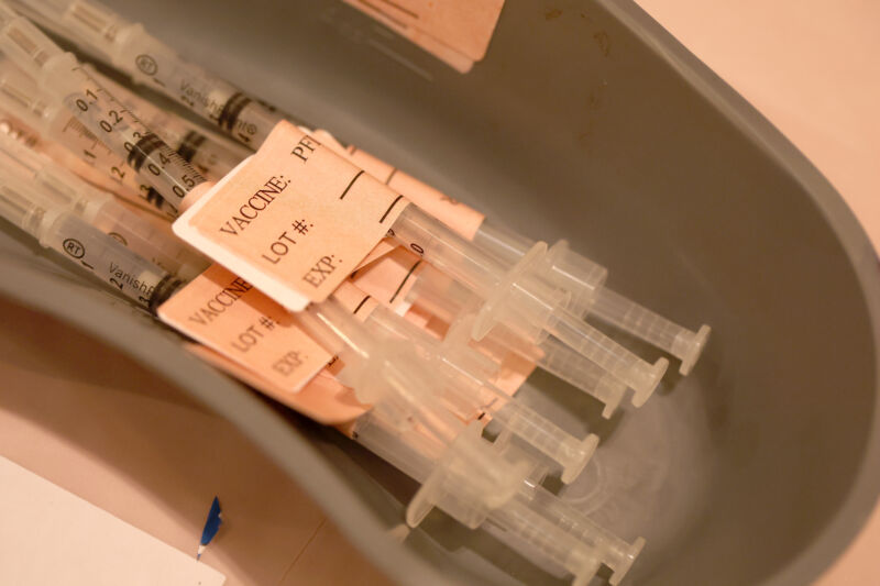 Syringes filled with COVID-19 vaccine sit on a table at a COVID-19 vaccination clinic on April 06, 2022 in San Rafael, California. 