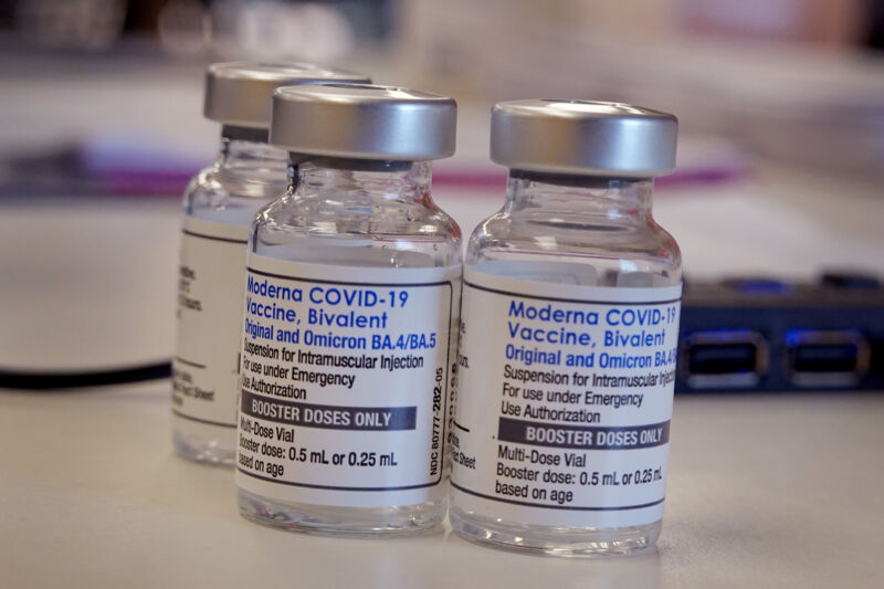 A pharmacist prepares to administer  COVID-19 vaccine booster shots during an event hosted by the Chicago Department of Public Health at the Southwest Senior Center on September 9 in Chicago. The recently authorized booster vaccine protects against the original SARS-CoV-2 virus and the more recent omicron variants, BA.4 and BA.5.