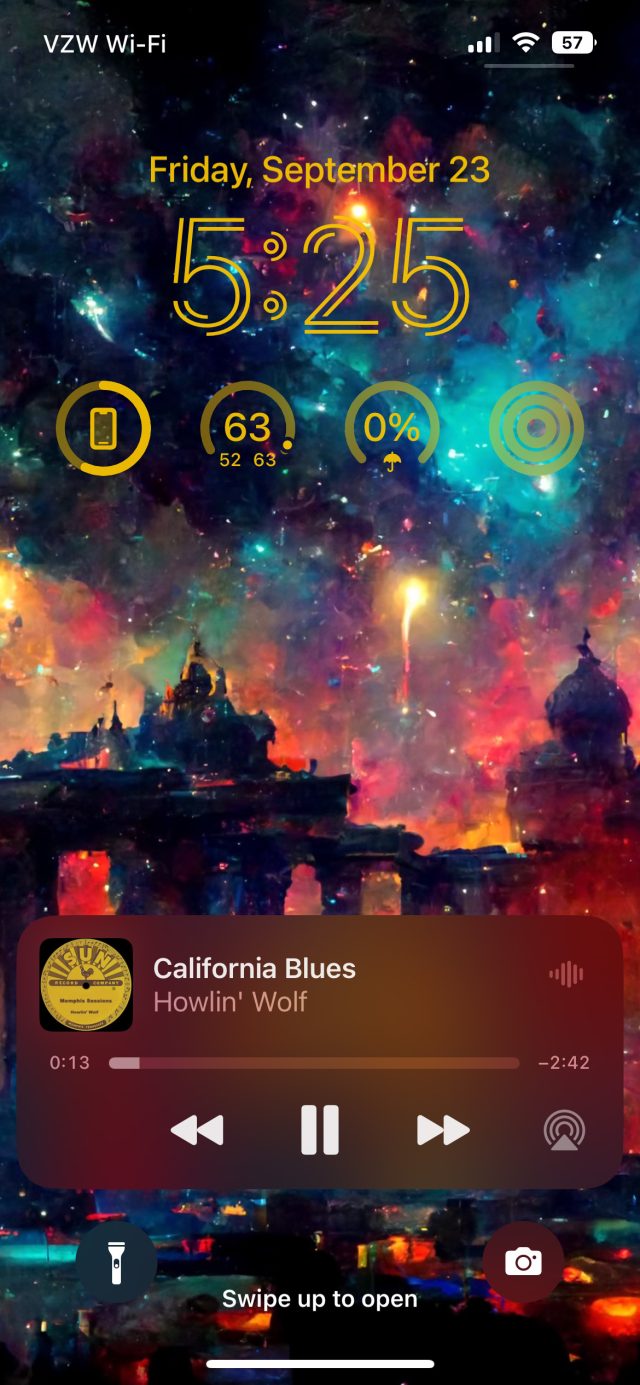 A music player with controls at the bottom of the lock screen