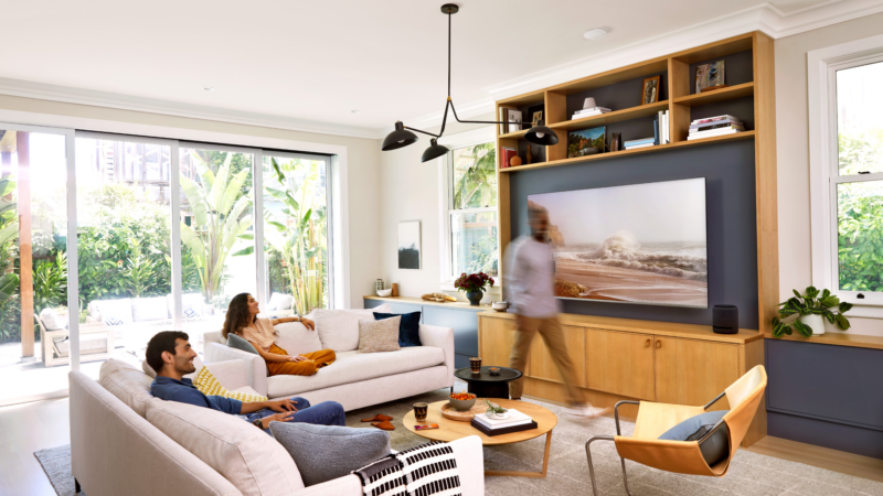 The people in this room are smiling because they know that little Wi-Fi hub on the ceiling could power a whole bunch of cameras and access points over Ethernet.