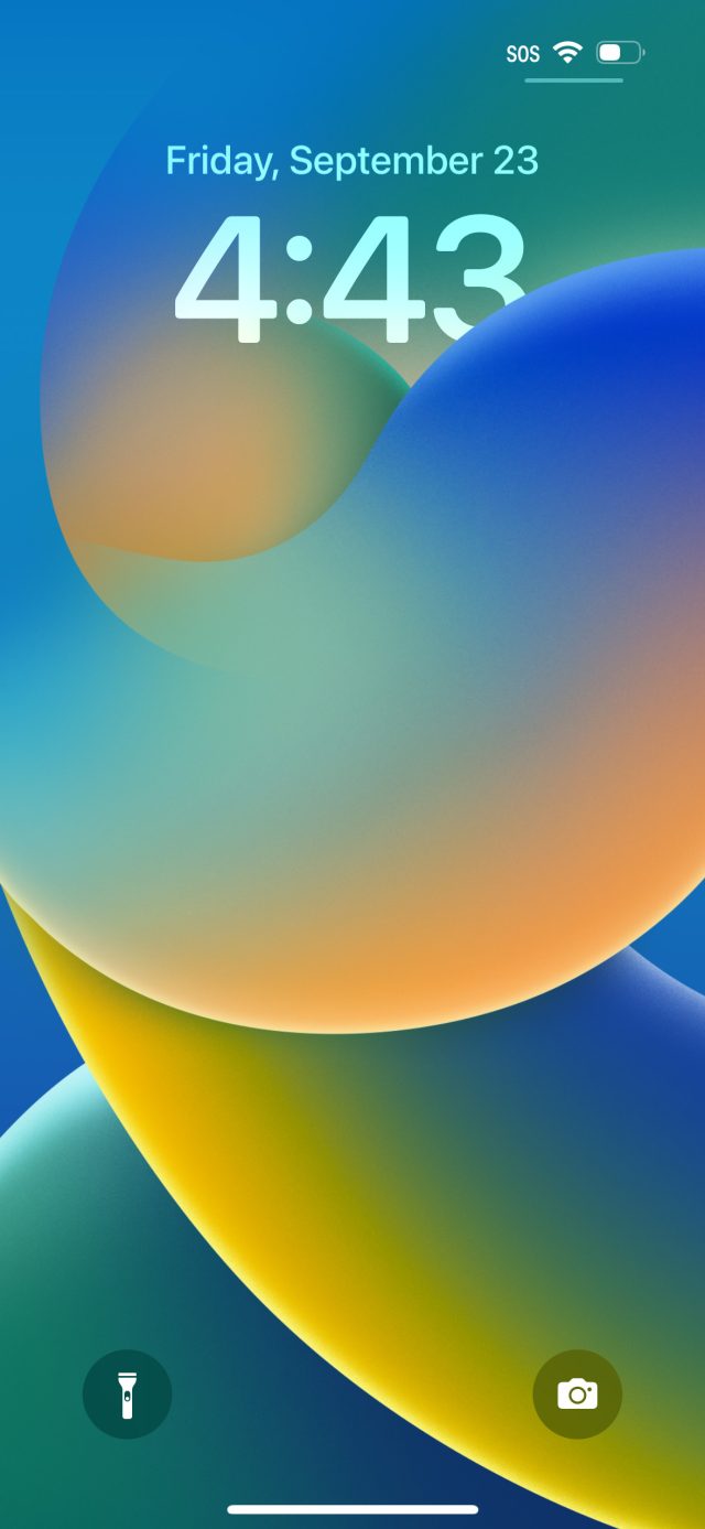 Colored swirls partially block the clock