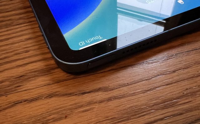 The power button with a Touch ID indicator under it