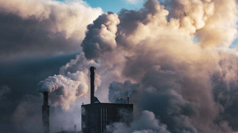 Image of a factory spewing pollution.