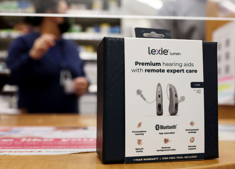 In this photo illustration, a Lexie Lumen hearing aid sits on a pharmacy counter in a Walgreens store on October 17 in Los Angeles.  Walgreens makes Lexie Lumen hearing aids available for sale to adults starting today following an FDA ruling allowing over-the-counter sales of hearing aids.