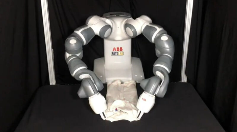 An ABB robot folding a shirt using the SpeedFolding method.
