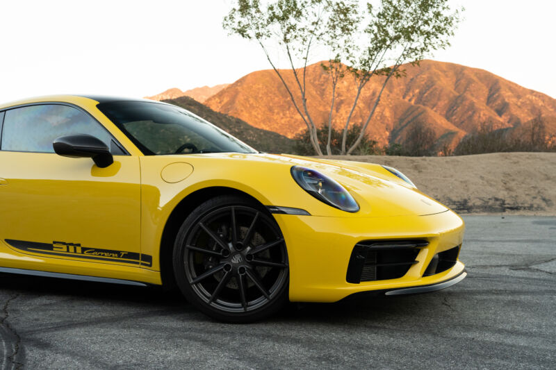 the front half of a yellow porsche 911 T