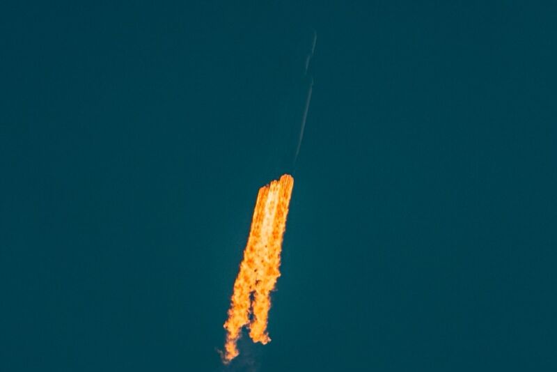 The Falcon Heavy rocket as seen at an altitude of about 160 meters on Tuesday, climbing above the fog but disappearing into haze.