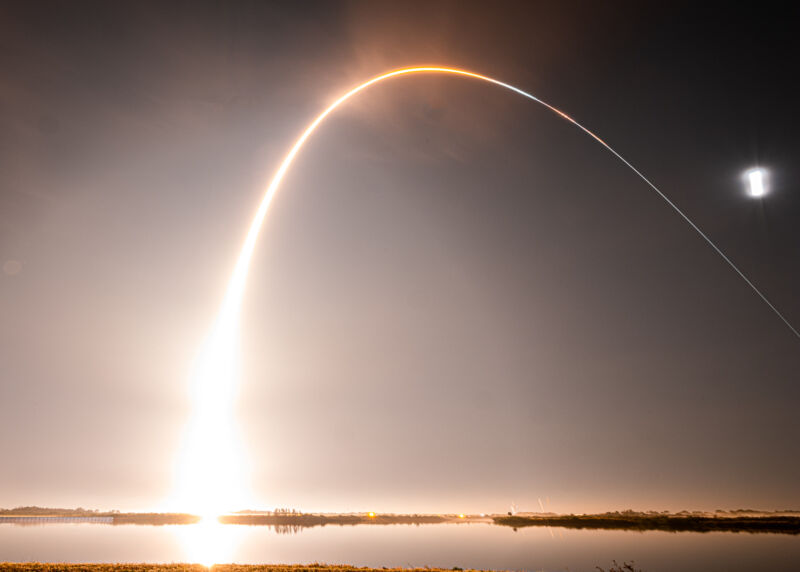 The Space Launch System rocket and Orion spacecraft streak away from Kennedy Space Center on Wednesday morning.