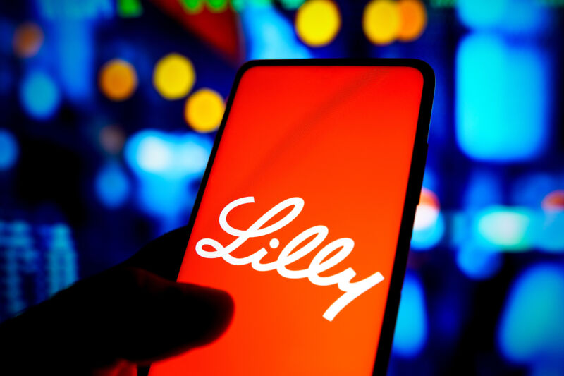 In this photo illustration the Eli Lilly and Company logo