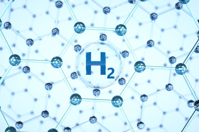 Image of a hydrogen symbol inside a mesh of linked molecules.