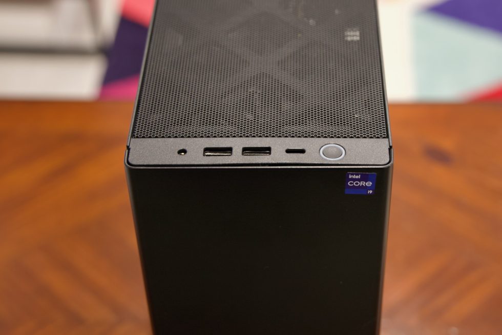 An audio jack, two USB-A ports and a USB-C port on the top of the NUC Extreme.