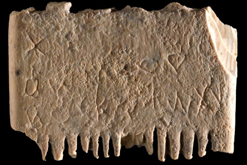 Archaeologists excavated this engraved ivory comb at an ancient site in Israel.