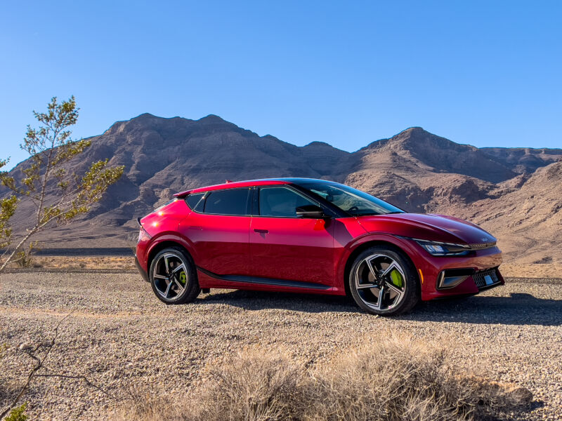 A red Kia EV6 GT in the desert