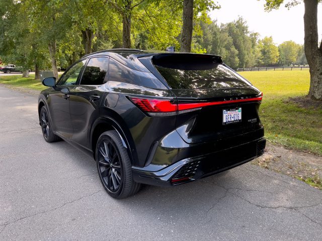 A Lexus RX 500h F Sport seen from the rear 3/4