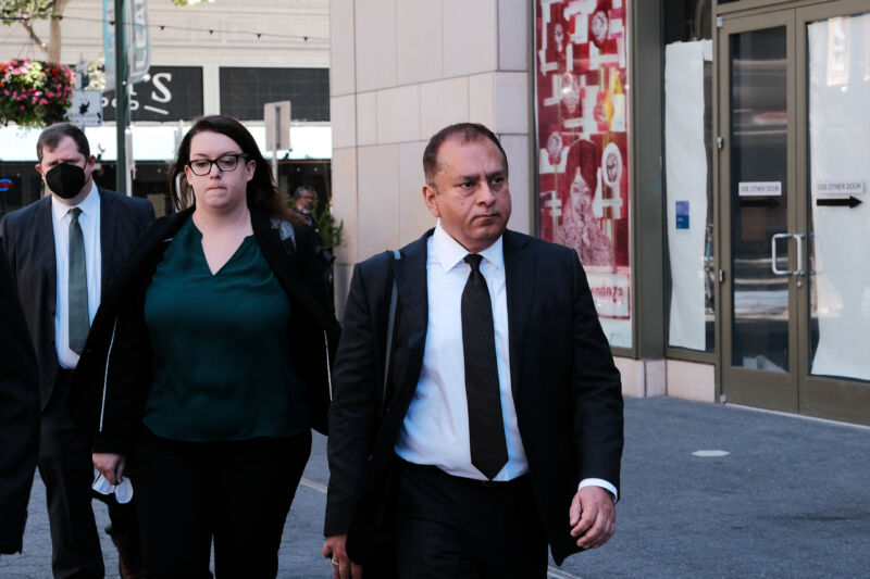 Former Theranos COO Ramesh "Sunny" Balwani and his legal team leave the Robert F. Peckham Federal Building on July 7, 2022 in San Jose, California. Balwani was found guilty on 12 counts of conspiracy and fraud for allegedly engaging in a multimillion-dollar scheme to defraud investors.