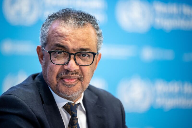 WHO Director-General Tedros Adhanom Ghebreyesus looks on during a press conference.