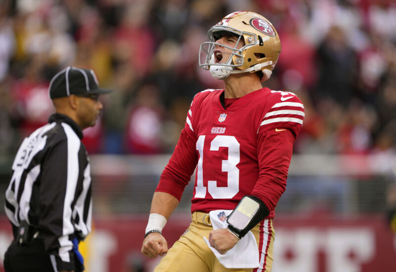 SANTA CLARA, CALIFORNIA - DECEMBER 11: The San Francisco 49ers new star quarterback, Brock Purdy, celebrates during a blowout 35-7 win over the Tom Brady-led Buccaneers.