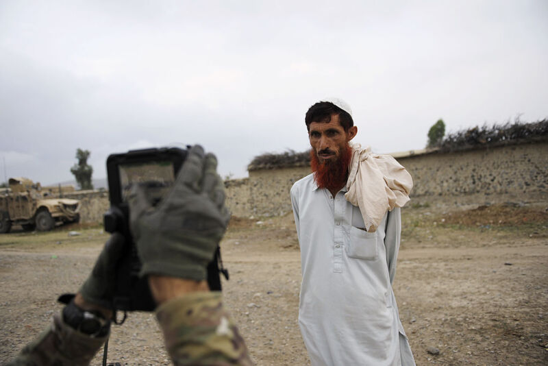 Soldier using the biometrics device