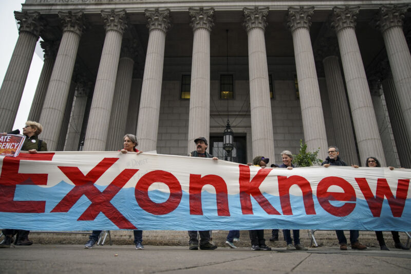 Environmental activists rally for accountability for fossil fuel companies outside of New York Supreme Court on October 22, 2019 in New York City.