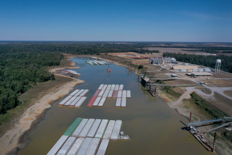 In this aerial view, barges, stranded by low water, sit at the Port of Rosedale along the Mississippi River on October 20, 2022, in Rosedale, Mississippi. 