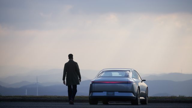 A man walks to an Afeela prototype