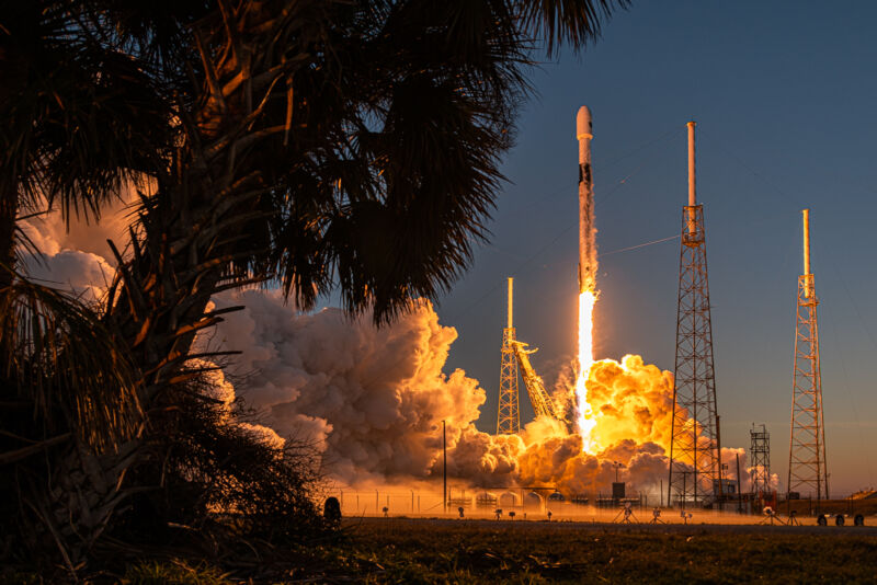 A Falcon 9 rocket launches in January 2023 carrying a GPS III satellite into orbit.