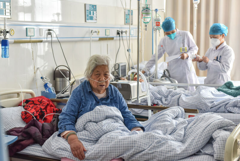 An elderly female patient with COVID-19 is treated at No. 2 People's Hospital of Fuyang City in China.