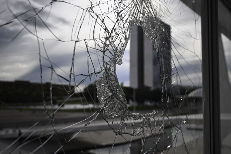 A view of a broken window after the supporters of Brazil's former President Jair Bolsonaro participated in an anti-democratic riot at Planalto Palace in Brasilia, Brazil on January 9, 2023.