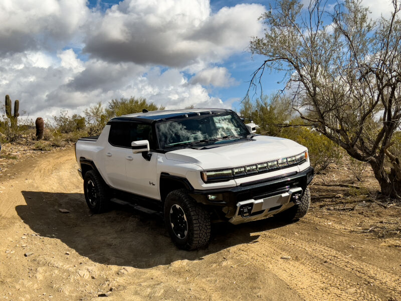 A Hummer EV drives off-road