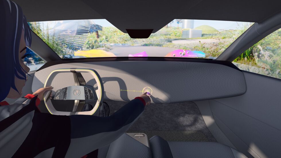 This rendering gives you an idea of what the augmented reality windshield would look like. You can also see the driver using the mixed reality slider, which is "shy tech" that's hidden behind the trim on the dashboard and invisible when not in use.