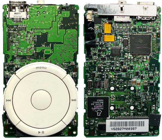 The original iPod motherboard. The ARM PP5502 SoC is in the bottom left; the FireWire controller is on the top right.