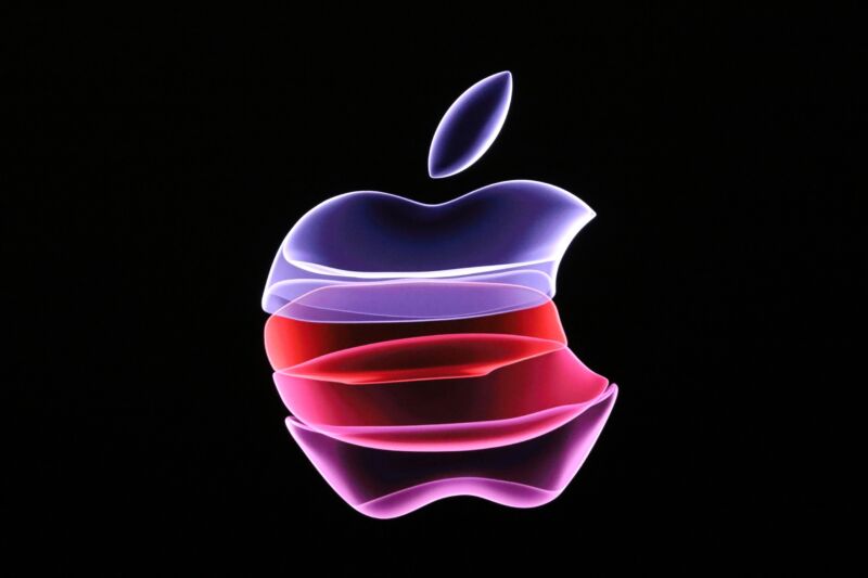 An Apple company logo seen on a screen during a product announcement event.