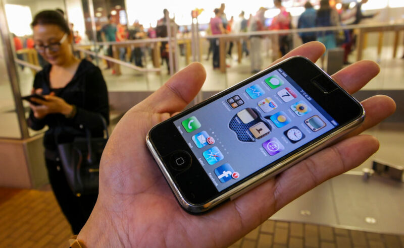 A picture shows the first iPhone which was launched in 2007. Pictured outside the Apple Store in Causeway Bay, Hong Kong. 07JAN17 SCMP/Martin Chan