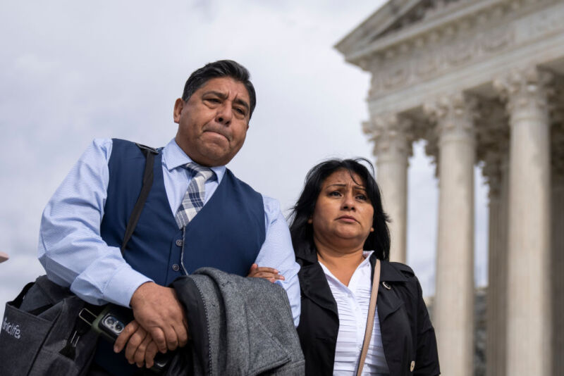 Jose Hernandez and Beatriz Gonzalez, stepfather and mother of Nohemi Gonzalez, who died in a terrorist attack in Paris in 2015, arrive to speak to the press outside of the US Supreme Court following oral arguments in <em>Gonzalez v. Google</em> on February 21 in Washington, DC. 