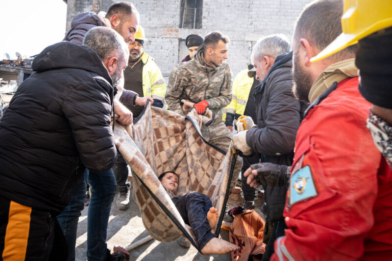 A child who escaped from under debris on February 8, 2023, in Hatay, Turkey. 