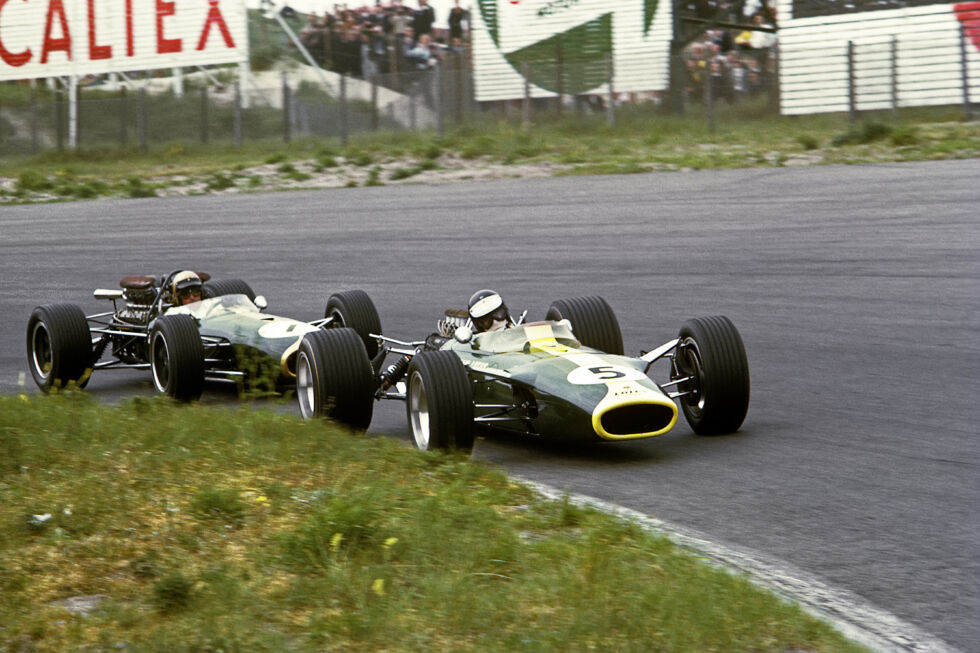The Lotus-Ford 49 of Jim Clark leads the Brabham-Repco BT19 of Jack Brabham at Zandvoort in Holland in 1967.