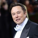 Elon Musk wearing a tuxedo.