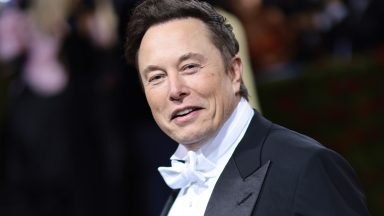 Elon Musk wearing a tuxedo.