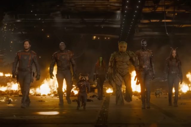 Guardians striding forward in a line