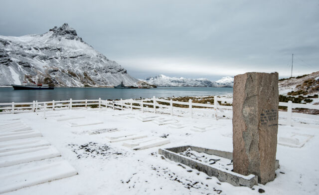 The grave of Sir Ernest Shackleton covered by snow at the former whaling station of Grytviken, South Georgia.