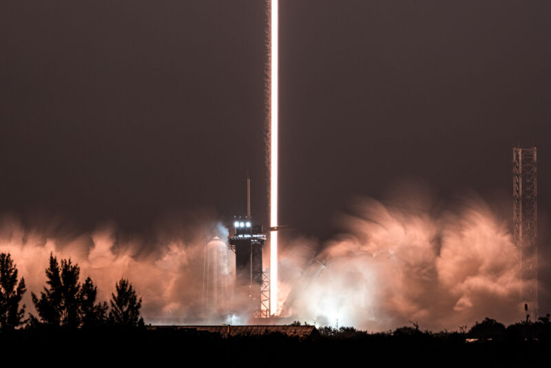 astronauts flying rocket