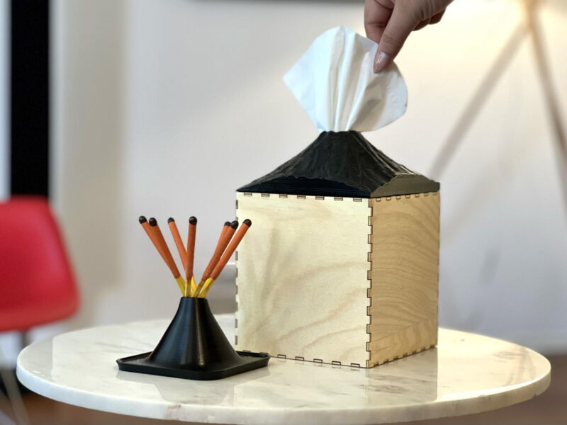 A volcano-themed tissue box designed using AI-assisted image generation