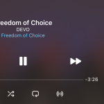 Apple CarPlay screenshot showing Devo's freedom of choice playing