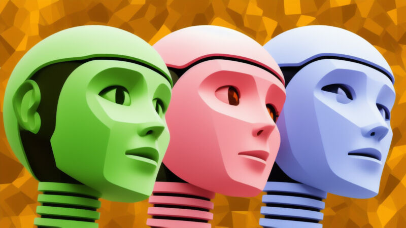 Three different-colored robot heads.