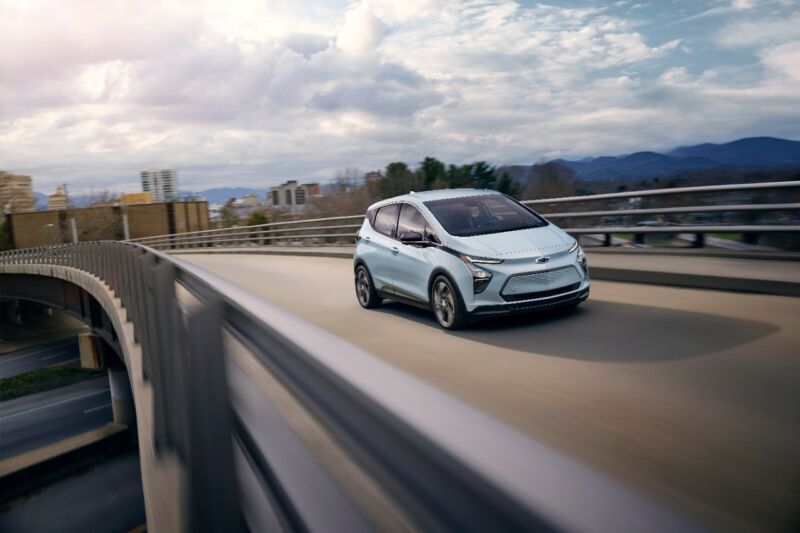 2023 Bolt EV front three-quarter driving on an overpass