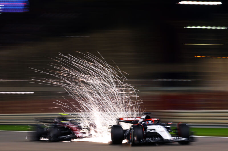 Nyck de Vries of Netherlands driving the (21) Scuderia AlphaTauri AT04 leads Zhou Guanyu of China driving the (24) Alfa Romeo F1 C43 Ferrari during the F1 Grand Prix of Bahrain at Bahrain International Circuit on March 05, 2023 in Bahrain, Bahrain.